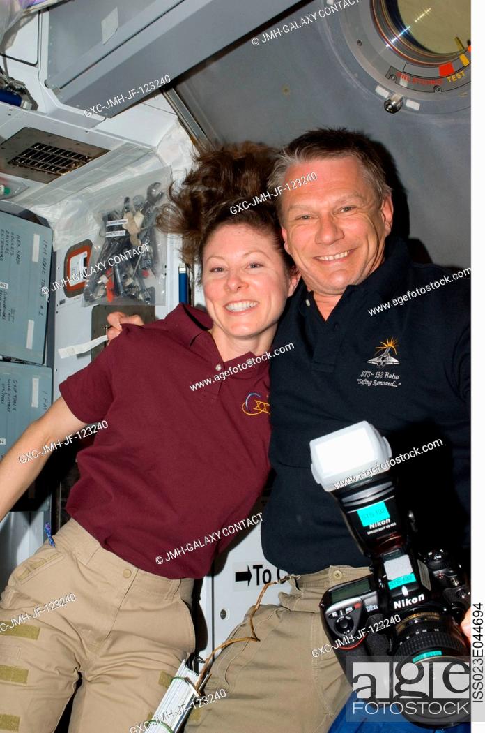 Stock Photo: Soon after initial hatch opening, NASA astronauts Tracy Caldwell Dyson, Expedition 23 flight engineer; and Piers Sellers, STS-132 mission specialist.
