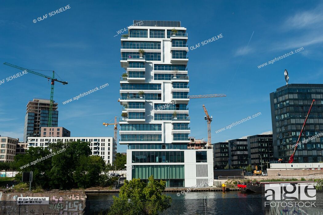 Stock Photo: Berlin, Germany, Europe - View of the Living Levels luxury residential tower block along the Spree River in Berlin Friedrichshain.