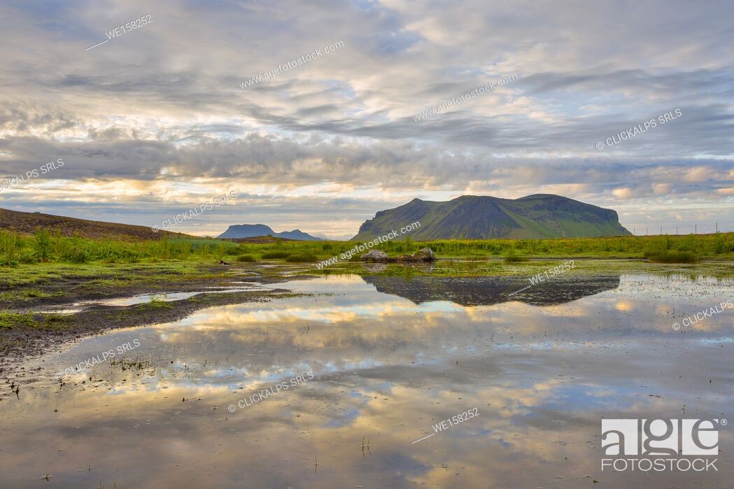 Stock Photo: Reflection of clouds in the water, Sudurland, South Iceland, Iceland.