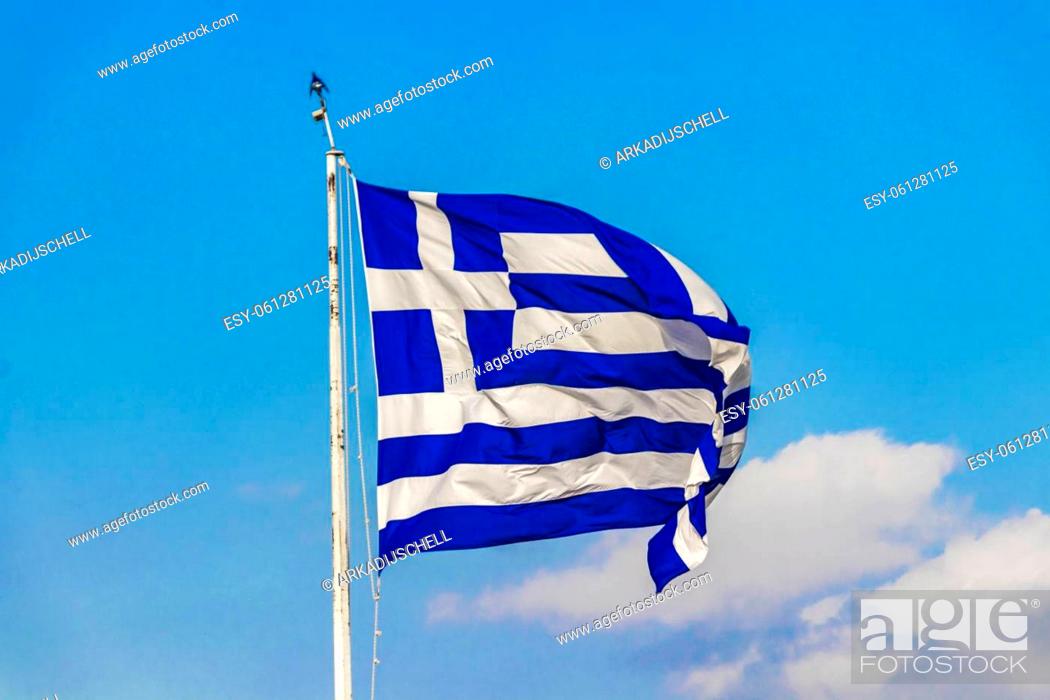 Photo de stock: Greek blue and white flag with blue sky background at the Acropolis of Athens in Greece's capital Athens in Greece.