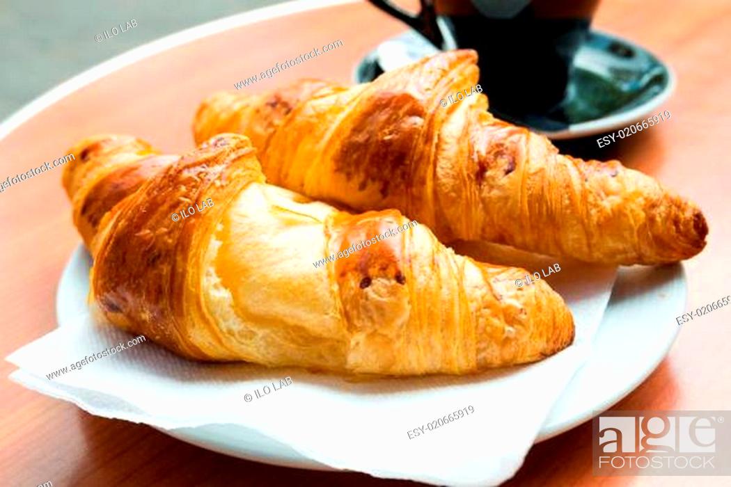 Stock Photo: coffee and croissants.