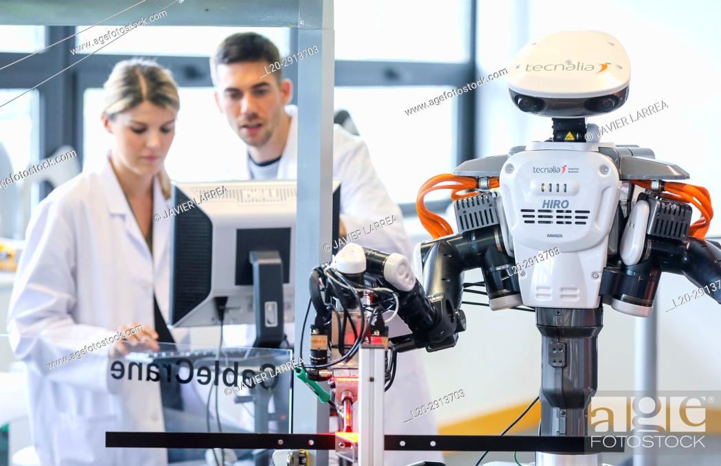 Stock Photo: Robot with two arms for flexible robotics. Humanoid robot for automotive assembly tasks in collaboration with people, Industry, Tecnalia Research & innovation.