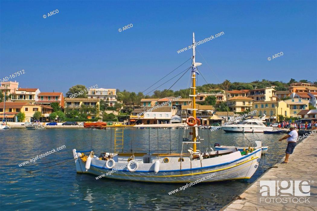 Stock Photo: Boat in harbour, Kassiopi, Korfu, Ionian Islands, Greece.