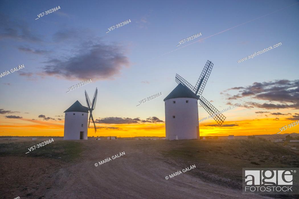 Stock Photo: Windmills at sunset. Tembleque, Toledo province, Castilla La Mancha, Spain.