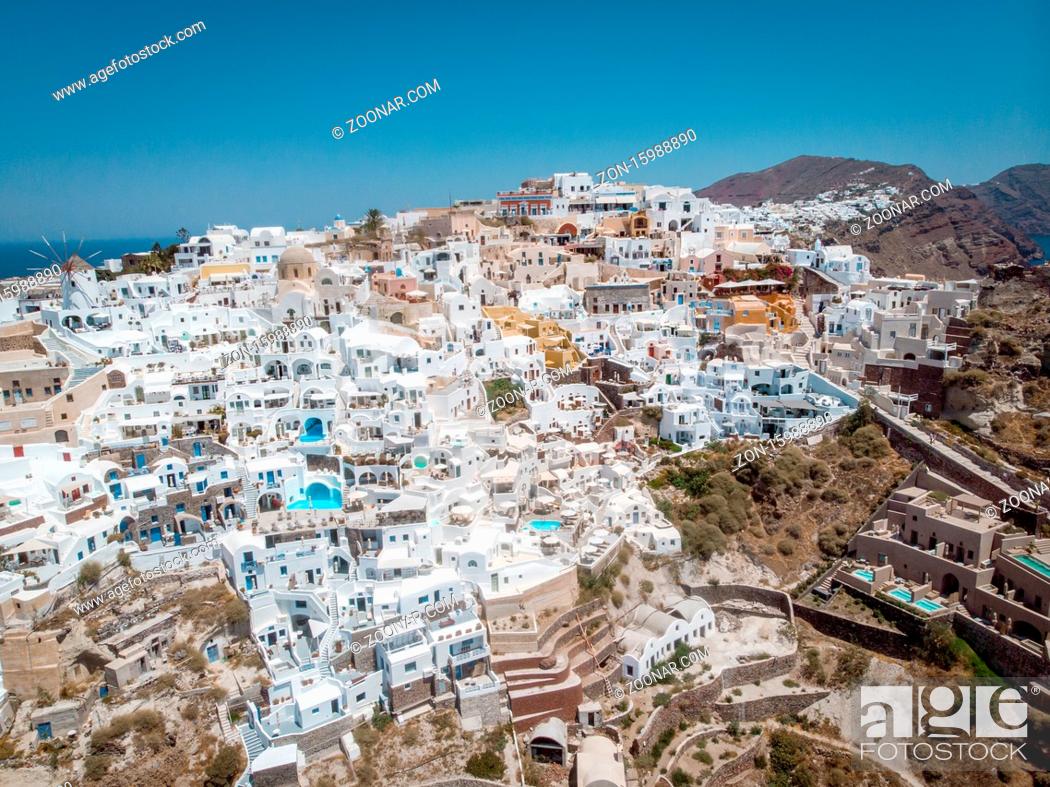 Elucidación como resultado ajo Drone view over Santorini, aerial view over the whitewashed village of Oia  with luxury vacation..., Foto de Stock, Imagen Derechos Protegidos Pic.  ZON-15988890 | agefotostock