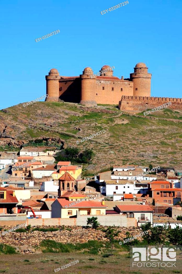 Stock Photo: View of the castle, built 1509 ? 1512, (Castillo de La Calahorra) and town, Lacalahorra, Granada Province, Andalusia, Spain.