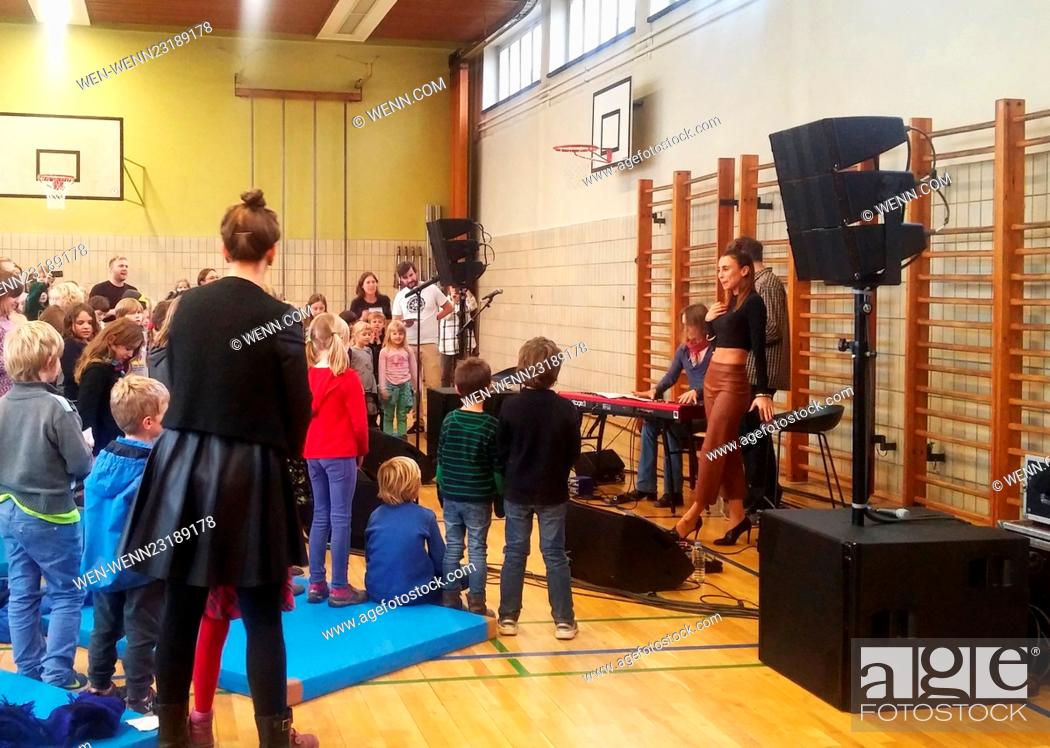 Stock Photo: Medina talks to children at a Scandinavian school in Berlin. Afterwards she performs some songs at the school's gym. Featuring: Medina Where: Berlin.
