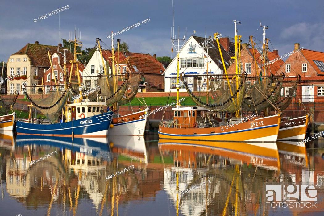 Stock Photo: Morning at the shrimp boat harbour of Greetsiel in East Friesland.