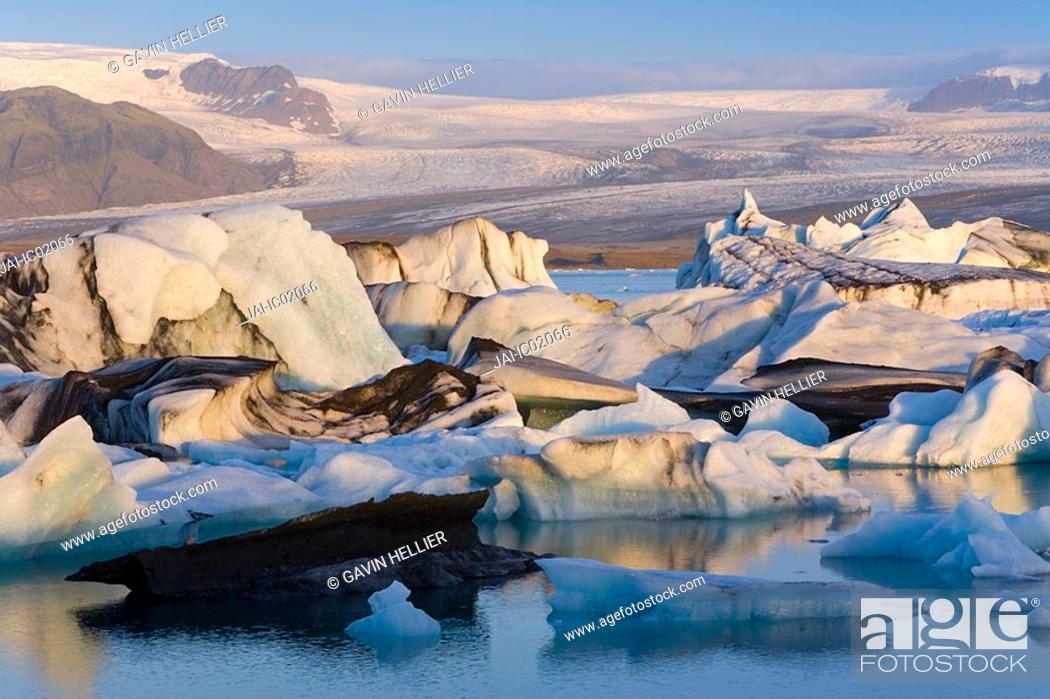 Stock Photo: Icebergs floating in the Lagoon beneath Breidamerkurjokull Glacier, Jokulsarlon, Iceland.