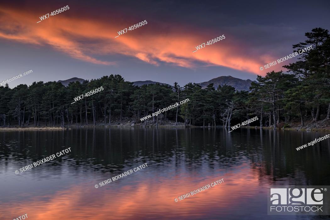Stock Photo: Red sunset in Bassa d'Oles lakes (Aran Valley, Catalonia, Spain, Pyrenees).
