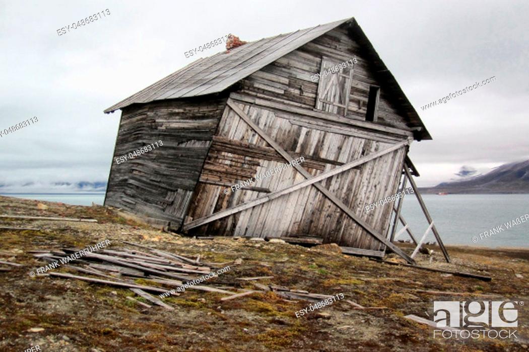 Stock Photo: Spitzbergen, old crooked wooden hut anno 1904, Recherchefjorden, Snatcherpynten.