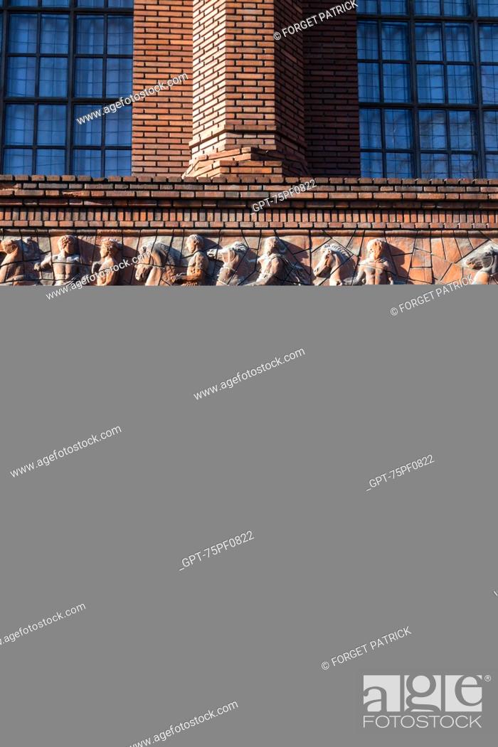 Stock Photo: STUDENT IN FRONT OF THE RED BRICK BUILDING OF THE UNIVERSITY OF PARIS, INSTITUTE OF ART AND ARCHEOLOGY, AVENUE DE L'OBSERVATOIRE, PARIS (75), FRANCE.