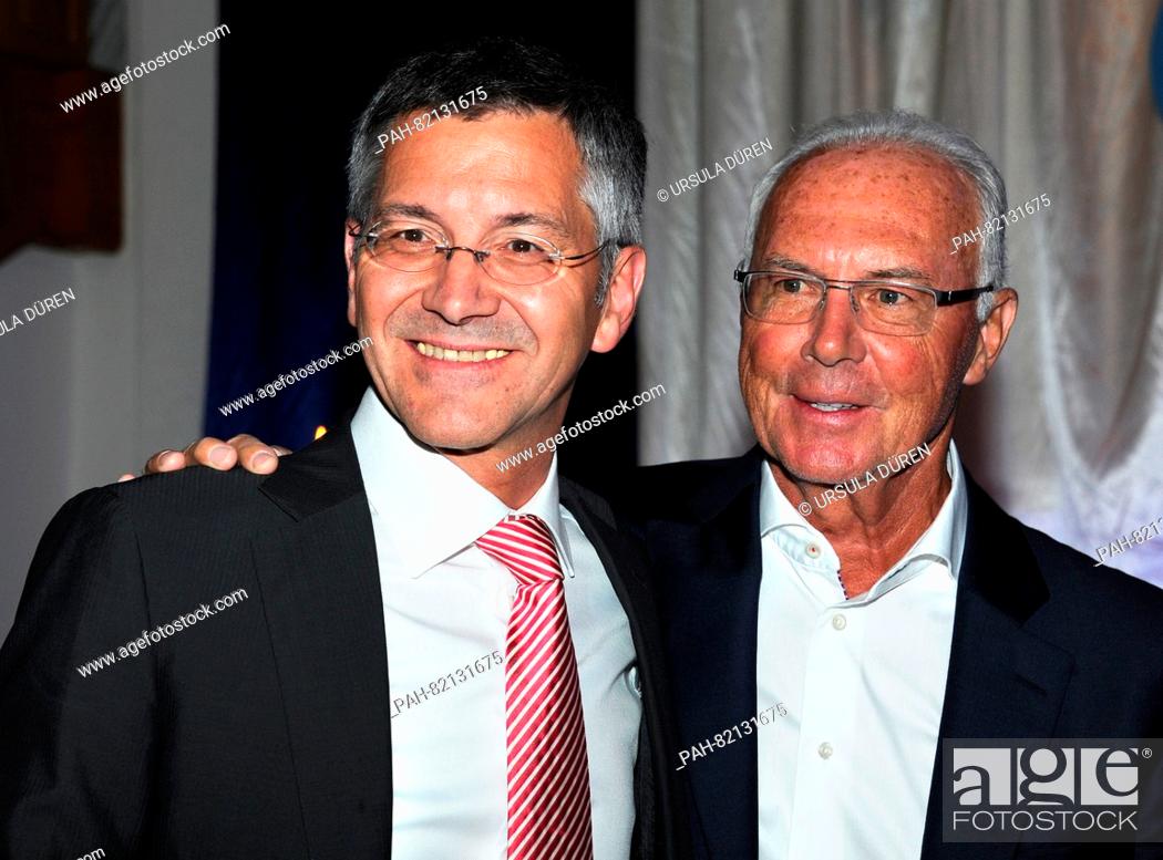 Stock Photo: Herbert Hainer, CEO of Adidas AG (l), and football legend Franz Beckenbauer, enjoying the gala that is being held as part of the 29th Kaiser Cup golf tournament.