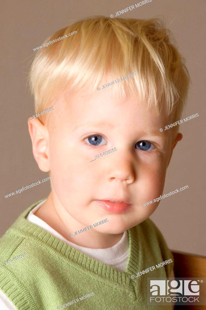 A blonde-hair, blue-eyed two year old boy looks straight at the camera,  Stock Photo, Picture And Rights Managed Image. Pic. XA6-698065 |  agefotostock