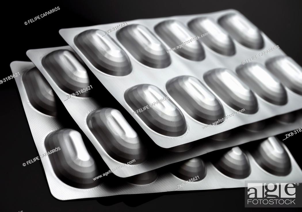 Stock Photo: Many Medicines Pills Capsules Of Diferent Size.
