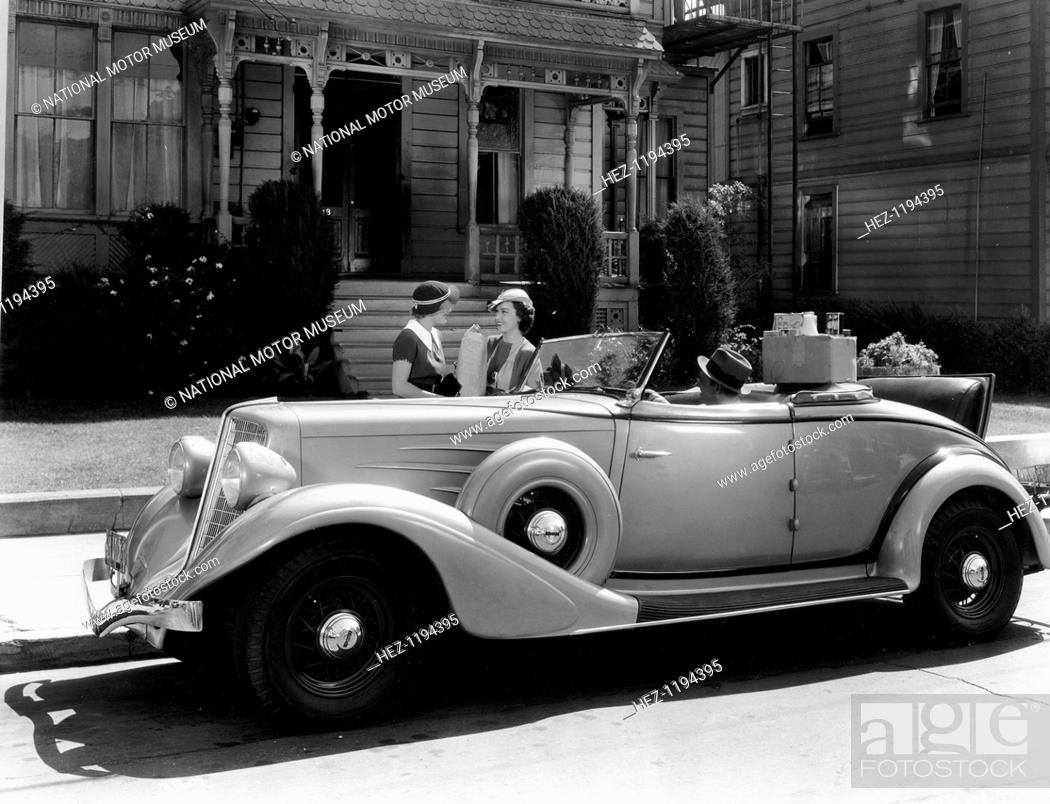 Stock Photo: Auburn 8 Convertible Coupe, 1934. In a scene from the Columbia Motion Picture White Lies (1934), Robert Allen sits in the car while Fay Wray and Irene Hervey.