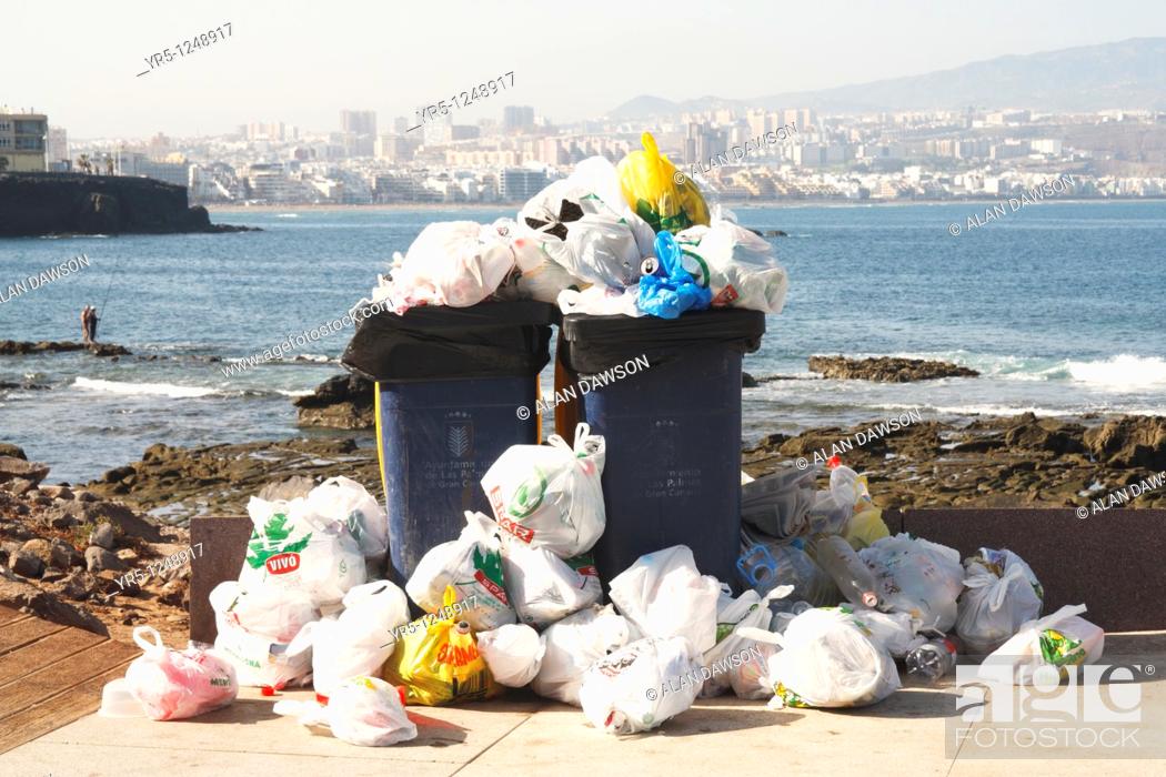 Stock Photo: Overflowing rubbish bins  El Confital, Las Palmas, Canary Islands, Spain.