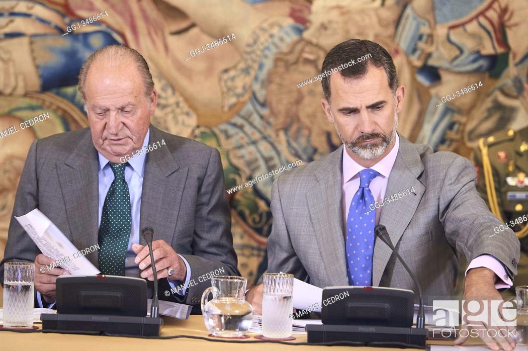 Stock Photo: King Felipe VI of Spain and King Juan Carlos of Spain attend a meeting with the Board of Cotec Foundation at Palacio de la Zarzuela on June 22.