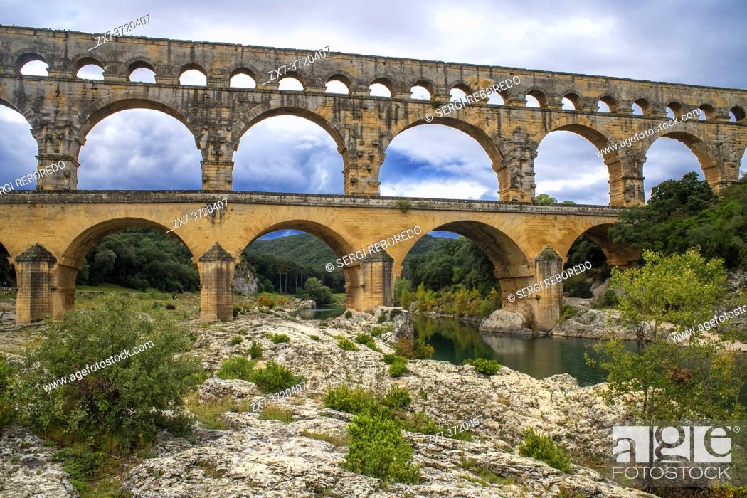 Stock Photo: Pont du Gard, Languedoc Roussillon region, France, Unesco World Heritage Site. Roman Aqueduct crosses the River Gardon near Vers-Pon-du-Gard.
