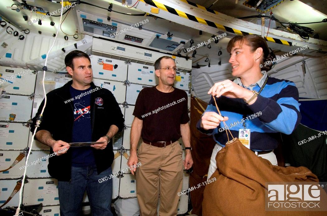 Stock Photo: Astronauts Gregory E. Chamitoff (left), Expedition 17 flight engineer; Donald R. Pettit and Heidemarie M. Stefanyshyn-Piper, both STS-126 mission specialists.
