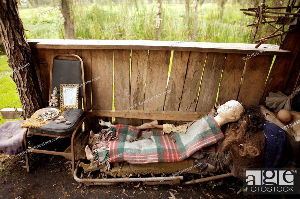 Stock Photo: A dolls lies on a chair on the Island of the Dolls in Xochimilco, southern Mexico City. The late Don Julian turned his 'chinampa.