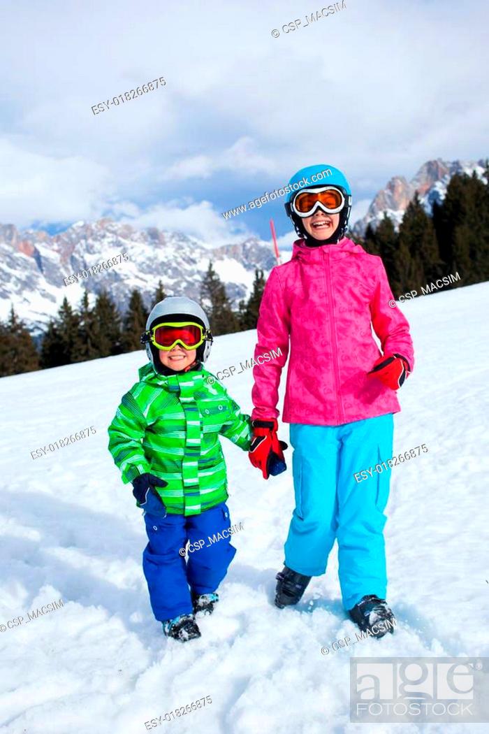 Stock Photo: kids has a fun on ski.