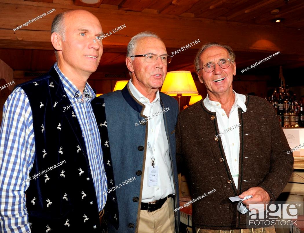 Stock Photo: Soccer legend Franz Beckenbauer (C), his son Thomas (L) and his brother Walter are pictured during the gala on occasion of 'Camp Beckenbauer' in Going, Austria.