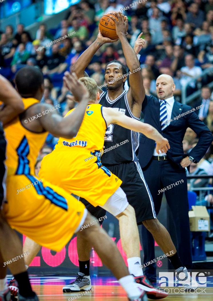 Stock Photo: Kawhi Leonard of the San Antonio Spurs in action during the NBA Global Games match between Alba Berlin and San Antonio Spurs at O2 World in Berlin, Germany.