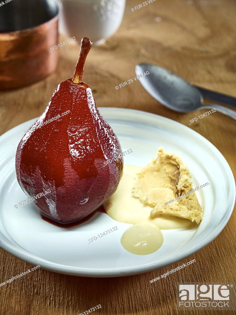 Stock Photo: Tipsy red wine pear with sabayon and caramel ice cream.