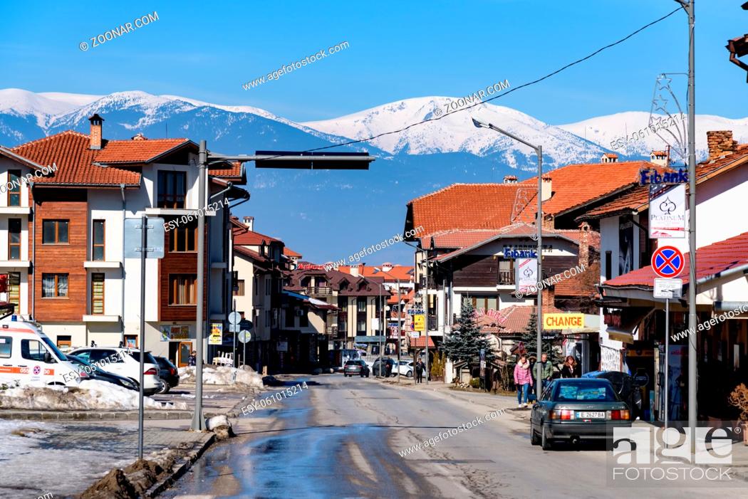 Stock Photo: Bansko, Bulgaria-February 12 .2019. Old streets of Bansko in Bulgaria.Nice Sunny weather. Holidays people relax in the ski resort in the winter.