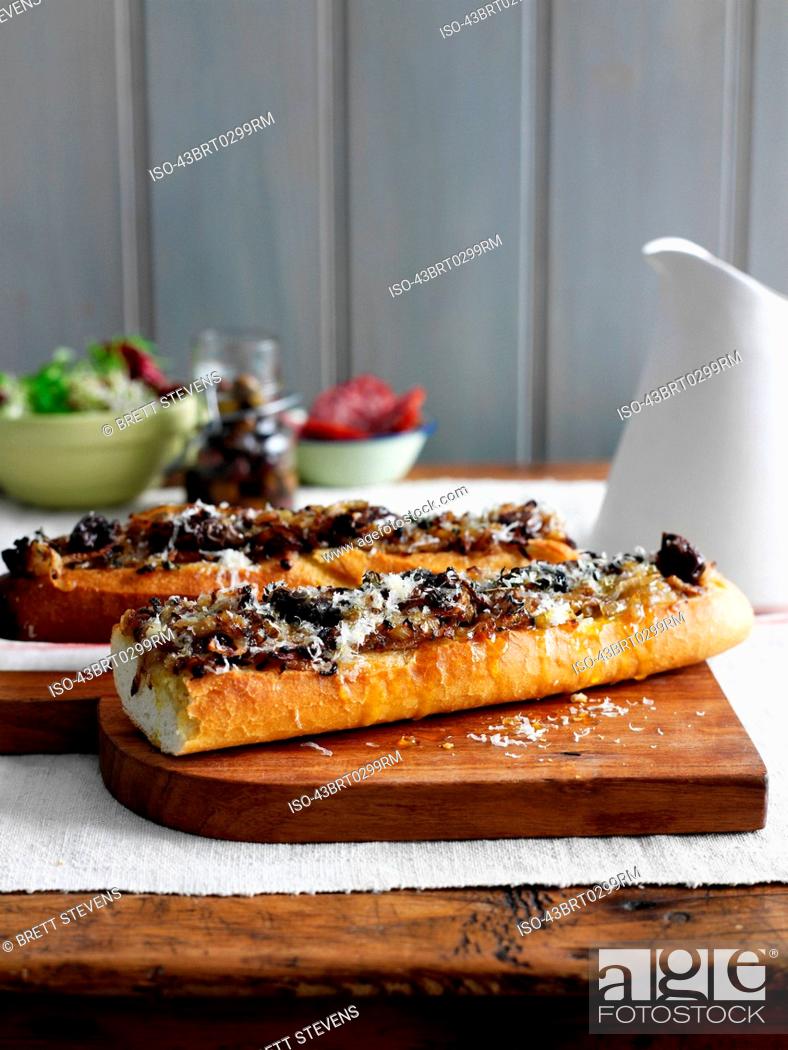 Stock Photo: Pork and cheese on baguettes.