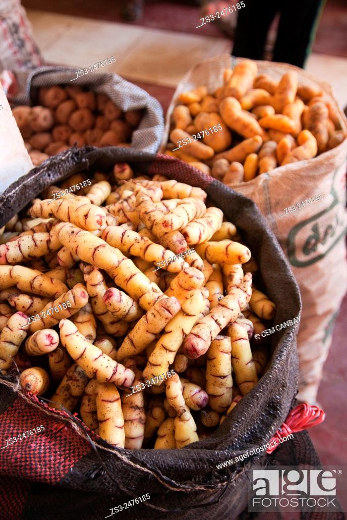 Stock Photo: Different kinf od native; potatoes in sacks at the market place, Pisaq, Sacred Valley, Peru, South America.