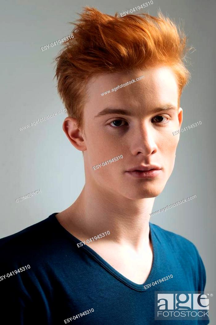 Haircut. Good-looking stern dark-eyed red-haired young man wearing a  t-shirt and staring and having..., Stock Photo, Picture And Low Budget  Royalty Free Image. Pic. ESY-041945310 | agefotostock