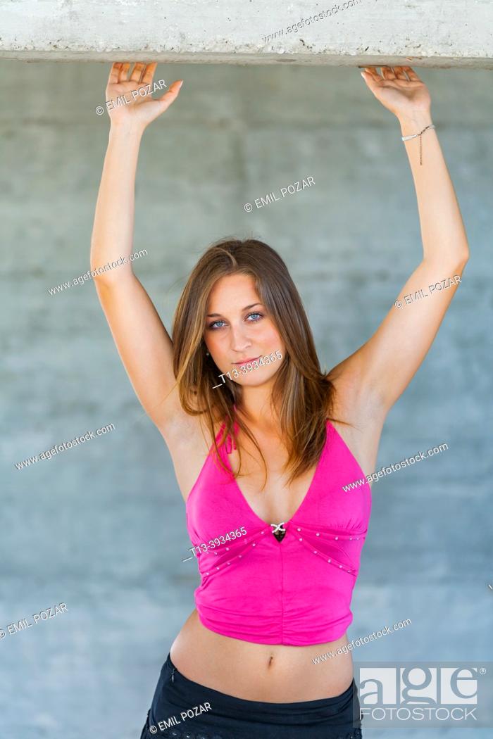 Photo de stock: Teenage girl raised arms.