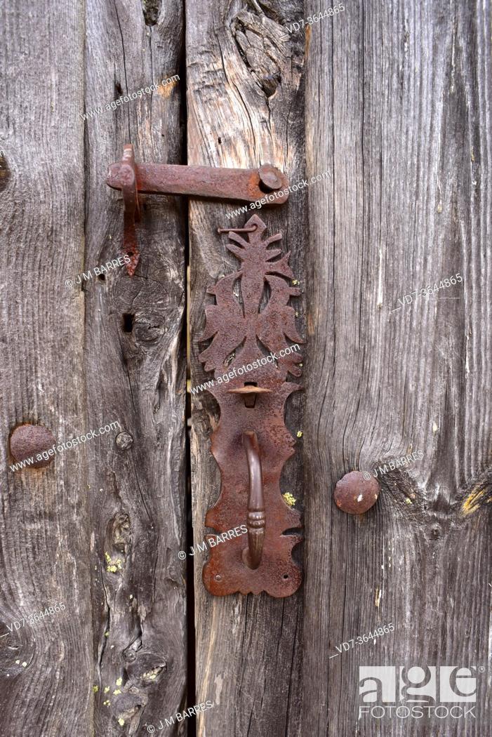 Stock Photo: Ironwork on a old wood door. Cozcurrita, Sayago, Zamora province, Castilla y Leon, Spain.