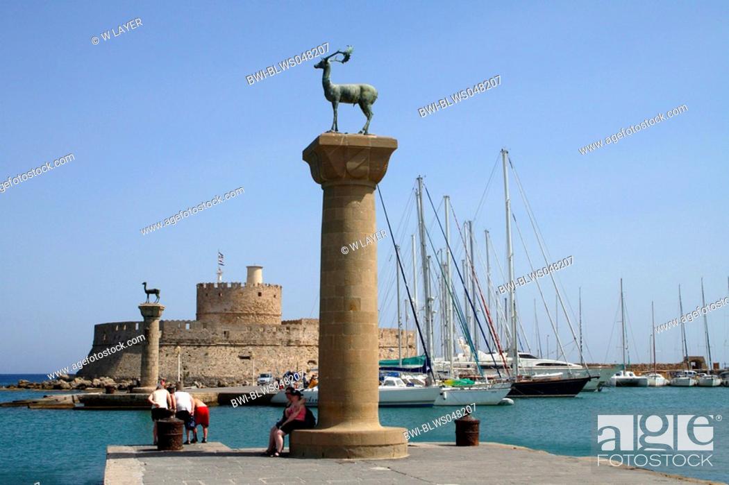 Old Town Of Rhodes Harbour Entrance With The Two Deer Stutues