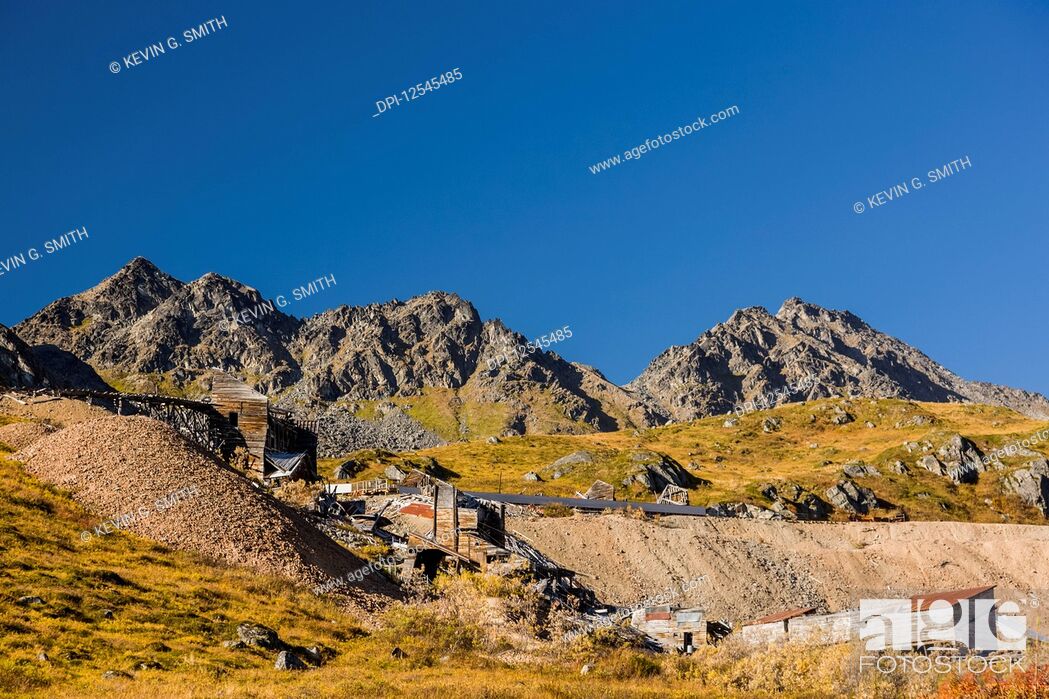 Stock Photo: Dilapidated mine infrastructure of Gold Mint Mine in Hatcher Pass, blue sky in the background, South-central Alaska; Palmer, Alaska, United States of America.