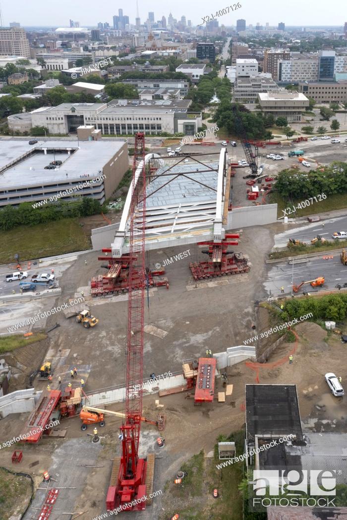 Stock Photo: Detroit, Michigan USA - 24 July 2022 - The new Second Avenue bridge is rolled into place across Interstate 94. The 5, 000.