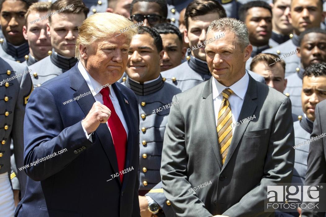 Stock Photo: U.S. President Donald Trump exits the rose garden after presenting the Commander-in-Chief’s trophy to the U.S. Military Academy football team in the White House.