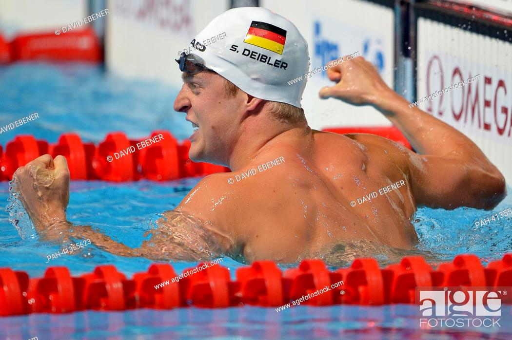 Stock Photo: Steffen Deibler of Germany celebrates after men's 50m butterfly semifinals of the 15th FINA Swimming World Championships at Palau Sant Jordi Arena in Barcelona.
