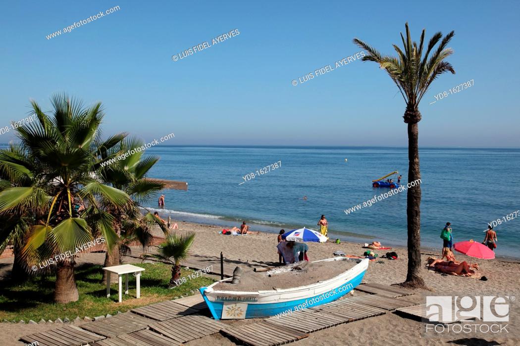 Stock Photo: Tourists enjoy the beach in Marbella, Andalusia, Spain, Europe.