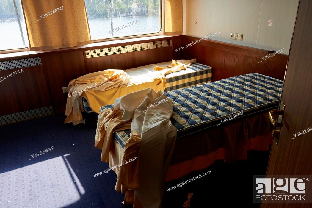 Stock Photo: abandoned cruise ship cabin interior.