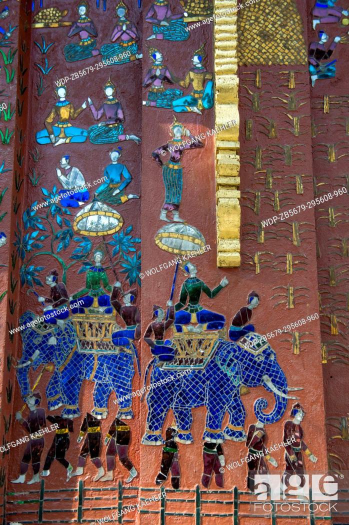 Stock Photo: Some of the exterior walls of the buildings at the Wat Xieng Thong in the UNESCO world heritage town of Luang Prabang in Central Laos contain colorful mosaics.