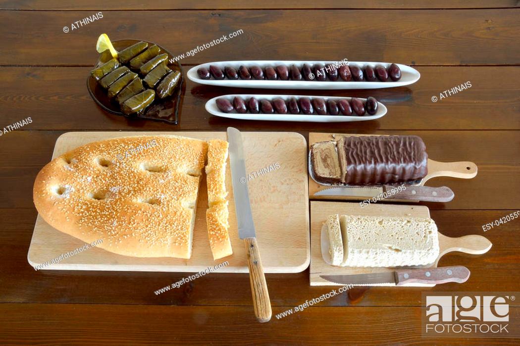Stock Photo: Olives, halva, lagana, stuffed grape leaves are some fasting food for Clean Monday.