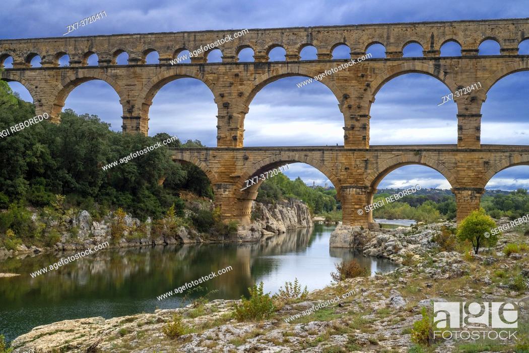 Stock Photo: Pont du Gard, Languedoc Roussillon region, France, Unesco World Heritage Site. Roman Aqueduct crosses the River Gardon near Vers-Pon-du-Gard.