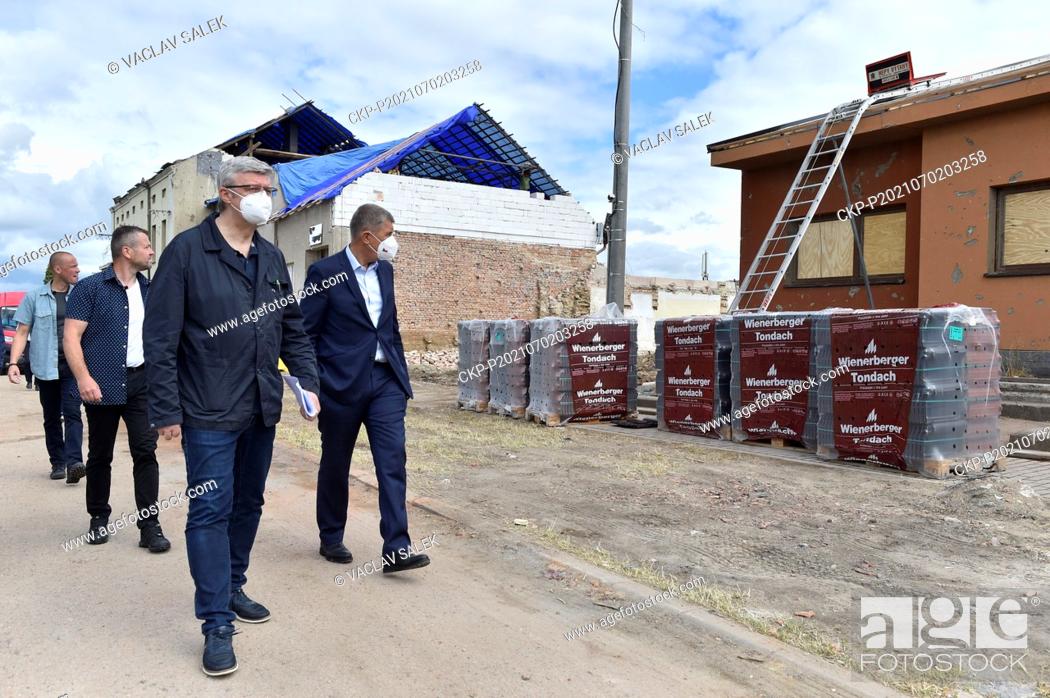 Stock Photo: Czech Industry and Trade, and Transport Minister Karel Havlicek, center, and Prime Minister Andrej Babis, right, visit Moravska Nova Ves village.