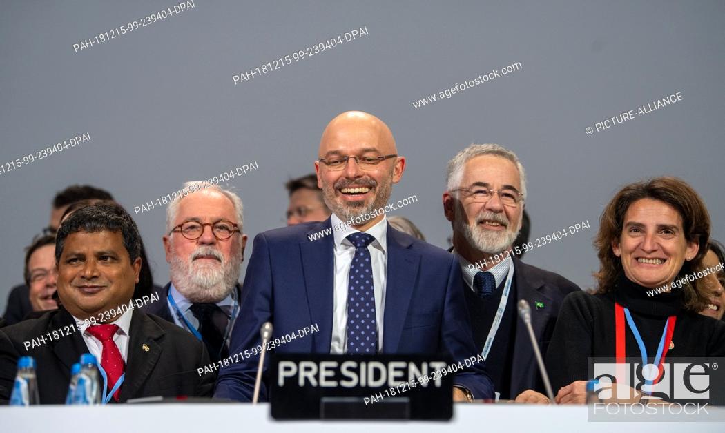 Stock Photo: 15 December 2018, Poland, Katowice: Michal Kurtyka (M), President of the UN Climate Change Conference COP24, and heads of delegations are pleased with the.