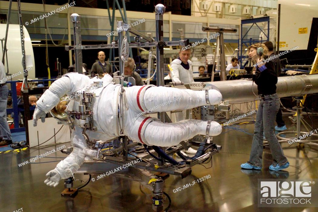 Stock Photo: Astronaut Piers J. Sellers, STS-121 mission specialist, wearing a training version of the Extravehicular Mobility Unit (EMU) space suit.