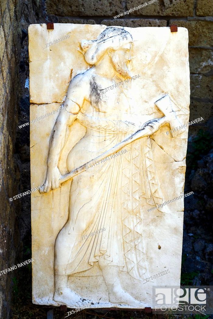 Imagen: Marble relief of the god Vulcan in The Sacred Area - Herculaneum ruins, Italy.