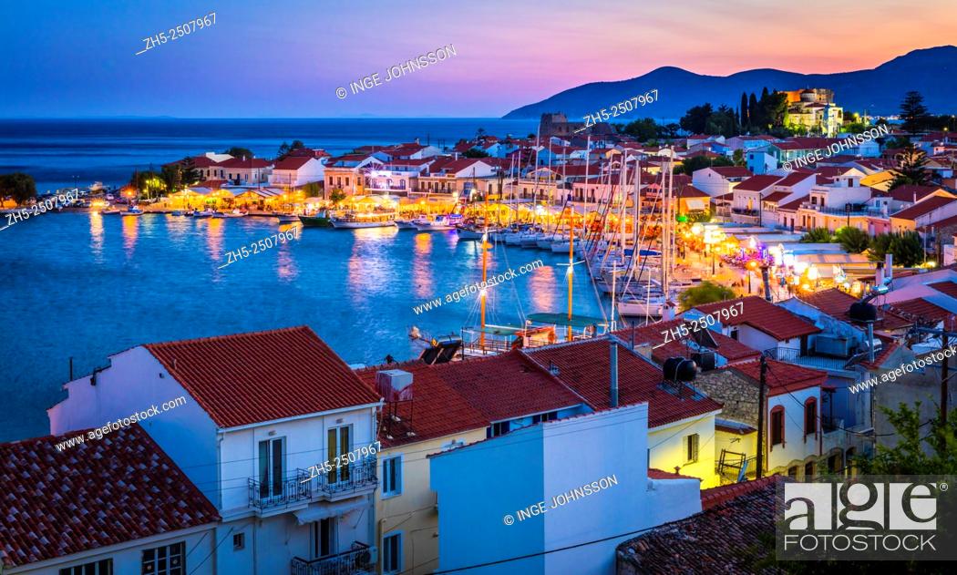 Stock Photo: Sunset over the small town of Pythagoreio on the greek island of Samos. Pythagoreio or Pythagoreion and Pythagorion is a small town and former municipality on.